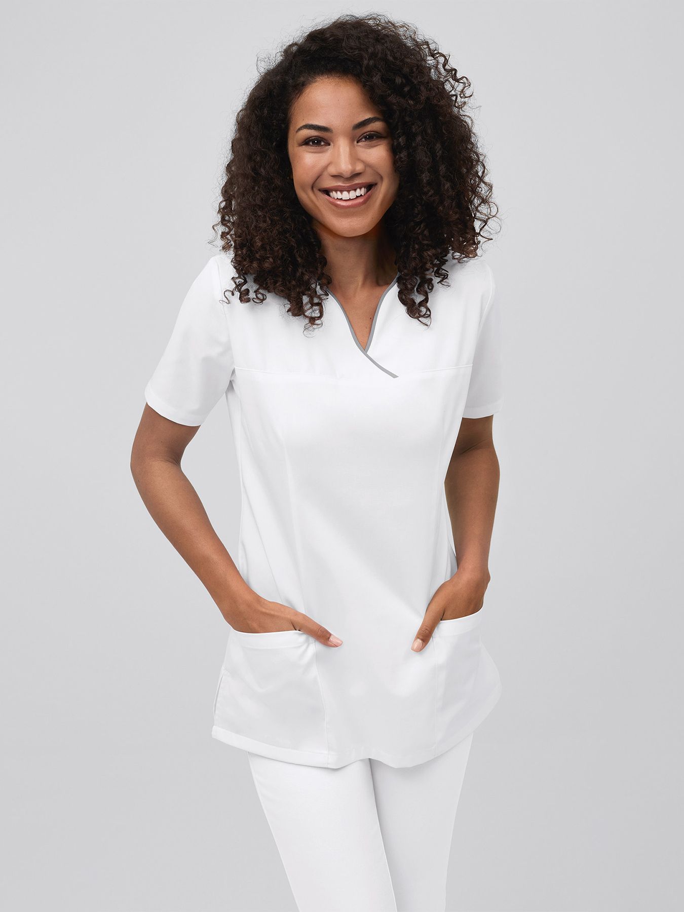 Damestuniek met gekleurde paspel